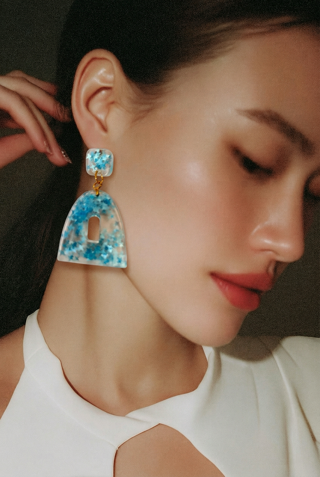 Glow in UV Light. Glam earring with UV stars, real party earring, one of a kind, not to be repeated.     A02