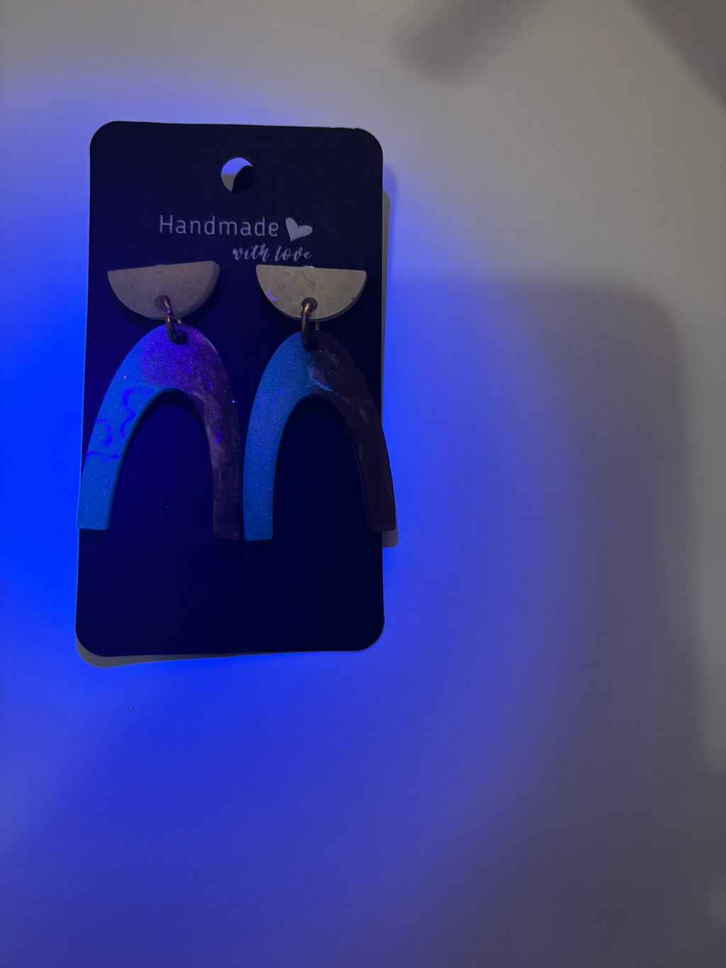 Party earring. Glow in UV lights, Unique handmade earring. looks good on you! one of a kind. never to be repeated.      D01