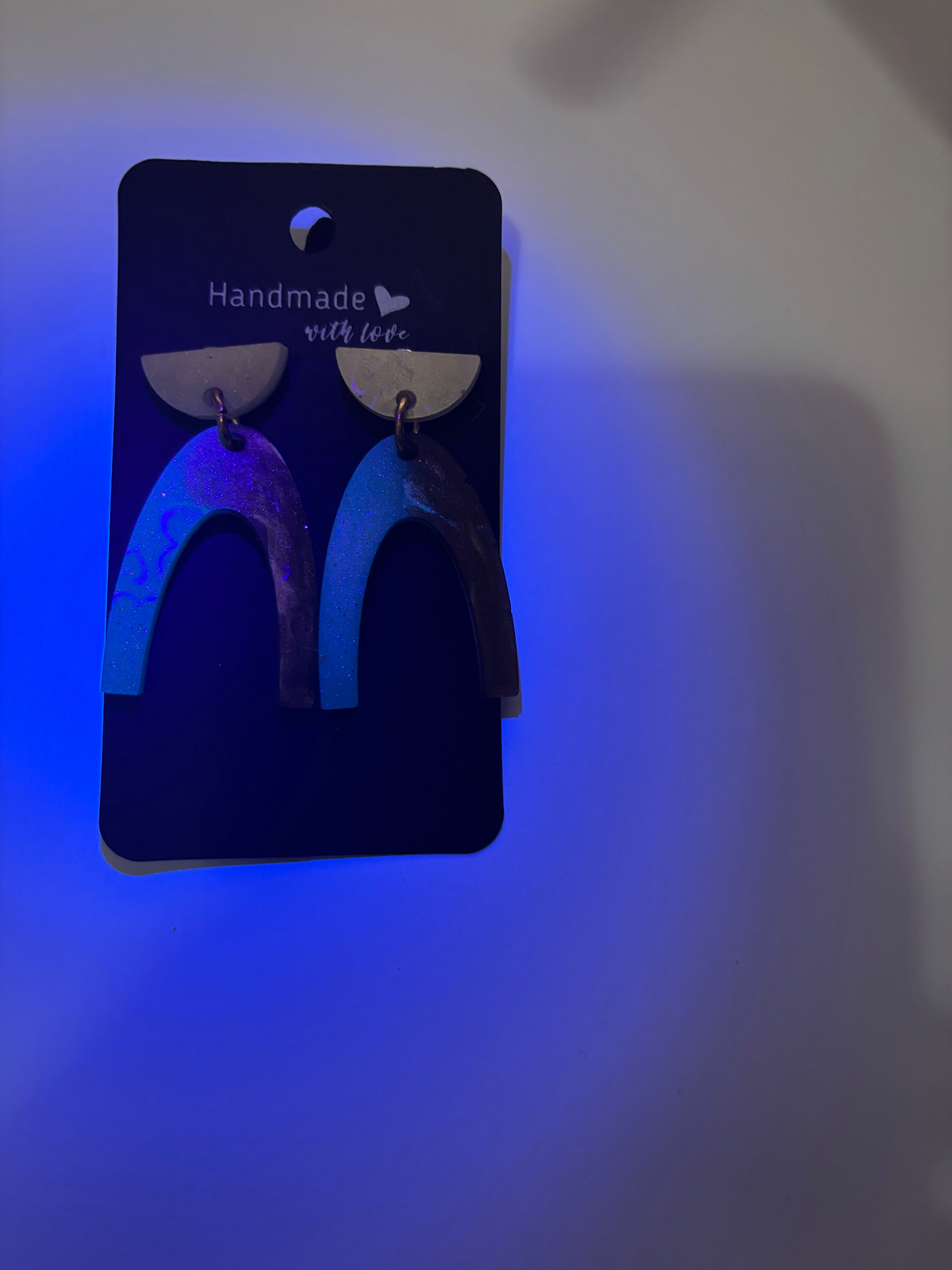 Party earring. Glow in UV lights, Unique handmade earring. looks good on you! one of a kind. never to be repeated.      D01