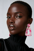 Glow in the dark and UV lights. Unique. Handmade earring. One of a kind. Never to be repeated. A must for your collection.     H07