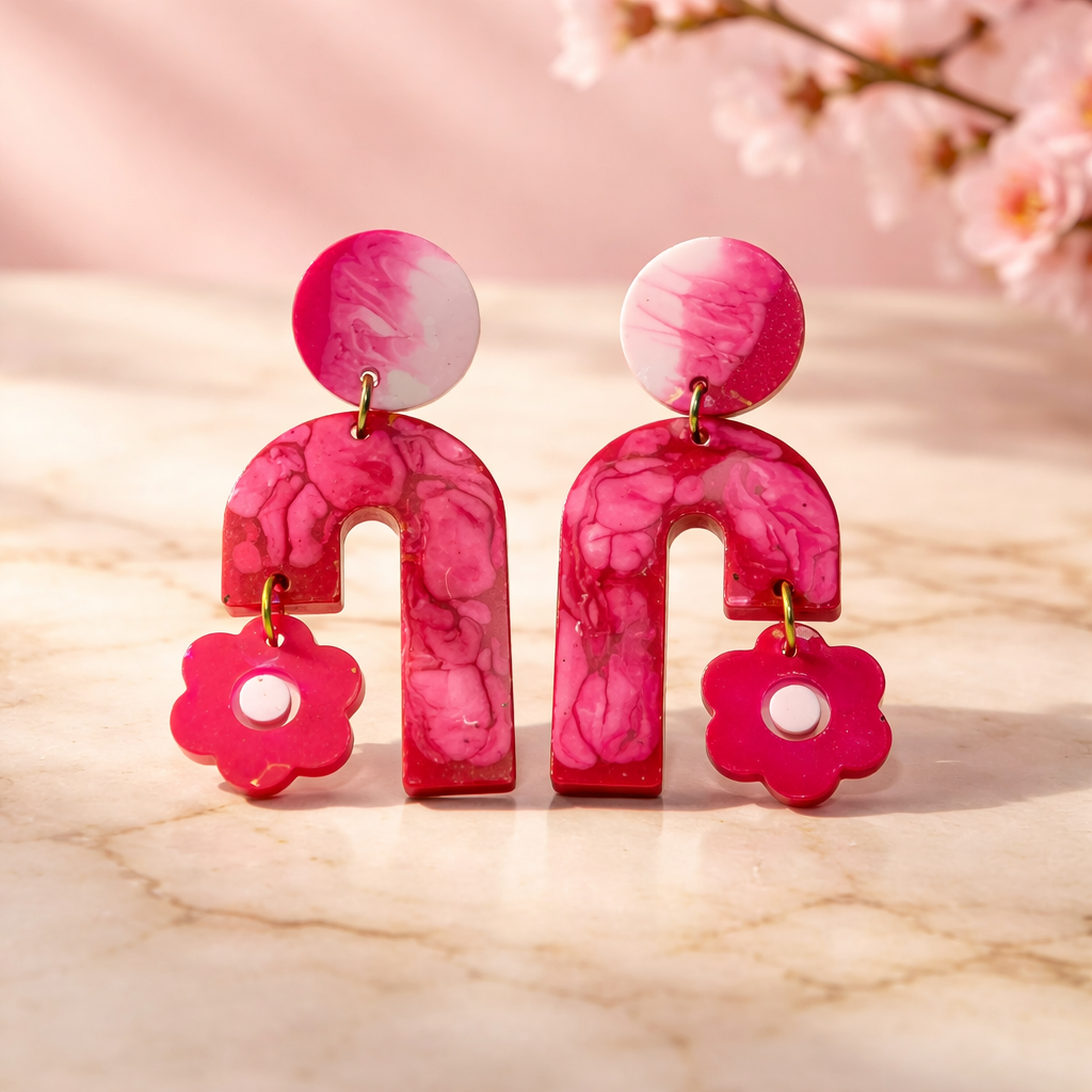 Party earring. Glows in UV lights. Unique Handmade  earring , Pink, rose red, white blended into a beautiful earring.One of a kind. Never to be repeated       A01