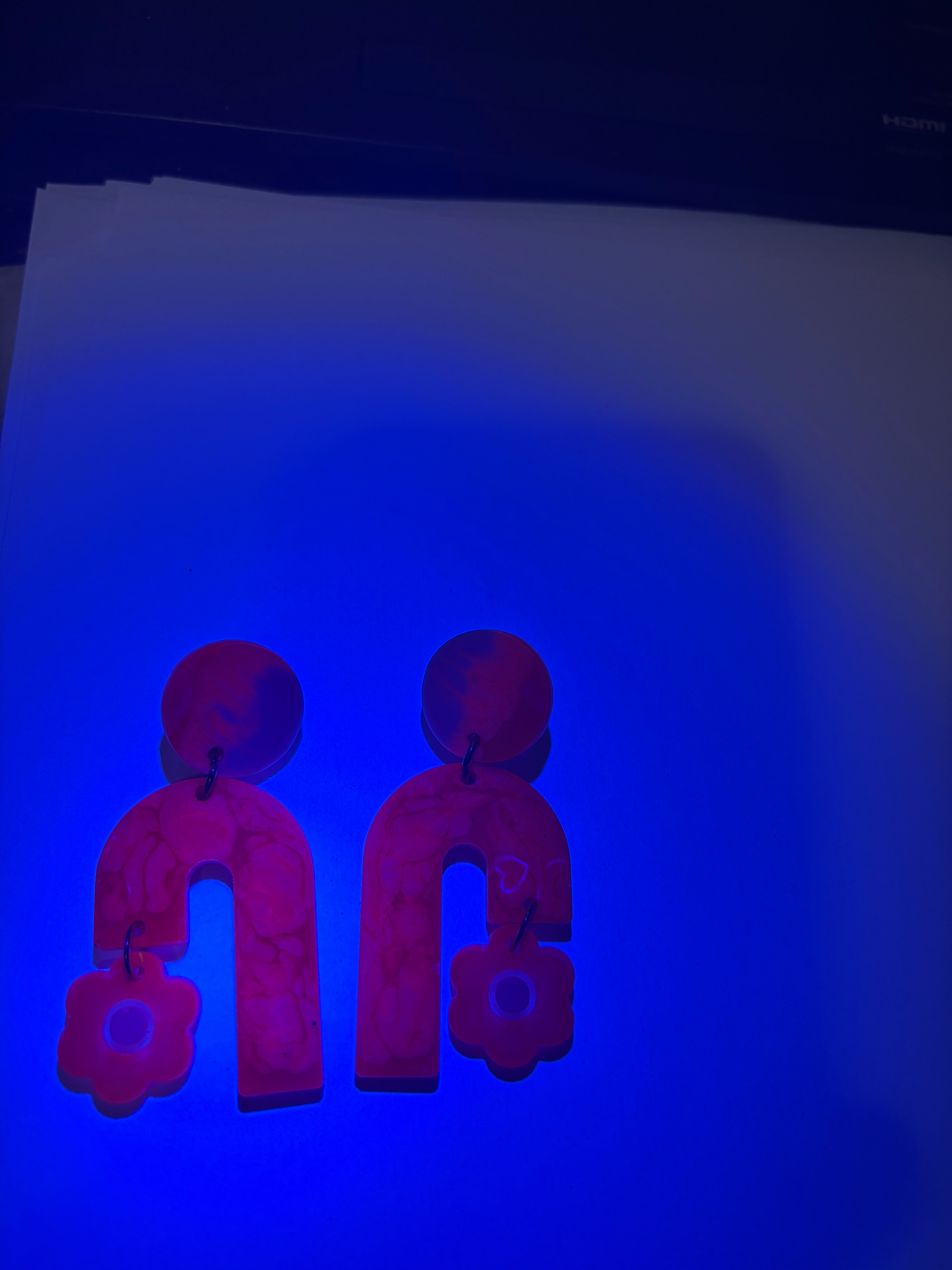 Party earring. Glows in UV lights. Unique Handmade  earring , Pink, rose red, white blended into a beautiful earring.One of a kind. Never to be repeated       A01