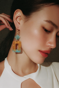 A Hypo-allergenic earring.Gold plated hooks, Handmade. Unique. Take me home to your collection.  K10