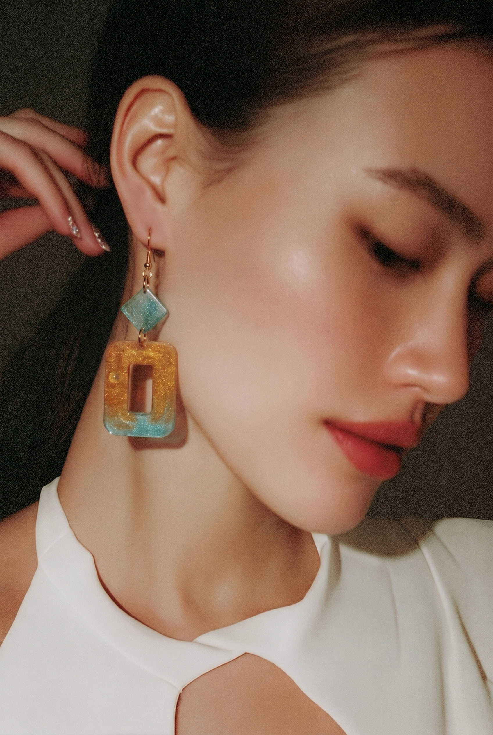 A Hypo-allergenic earring.Gold plated hooks, Handmade. Unique. Take me home to your collection.  K10