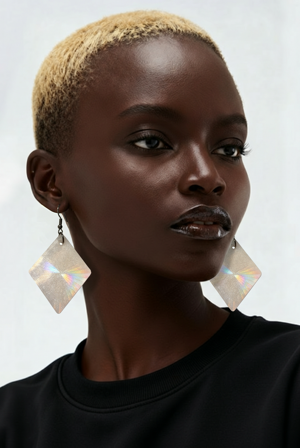 A handmade earring. Unique. Exquisite. One of a kind. Take me to a party.  K13