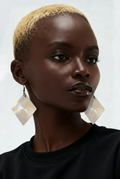 A handmade earring. Unique. Exquisite. One of a kind. Take me to a party.  K13