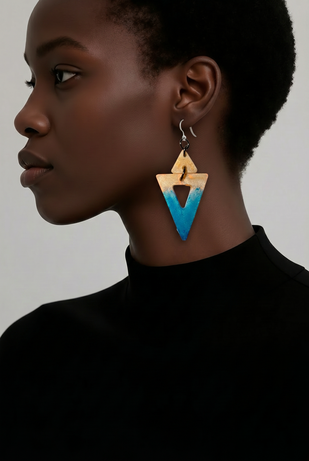 A bold eye-catching pair, designed to standout whilst lightweight, UV reflective (great party earring) and fitted with hypo-allergenic hooks to be comfortable for all day and the party tonight. L01