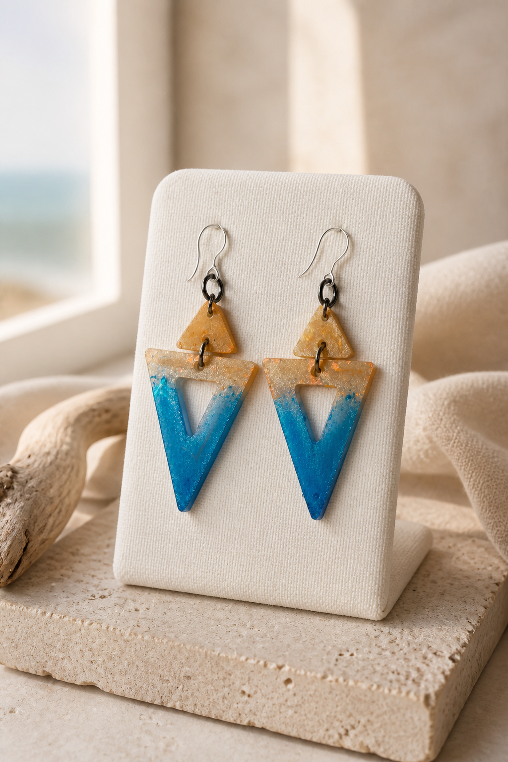 A bold eye-catching pair, designed to standout whilst lightweight, UV reflective (great party earring) and fitted with hypo-allergenic hooks to be comfortable for all day and the party tonight. L01