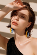 An elegant easy wearing hypo-allergenic earring. Turn heads with this one! One of a kind and not to be repeated.  L05