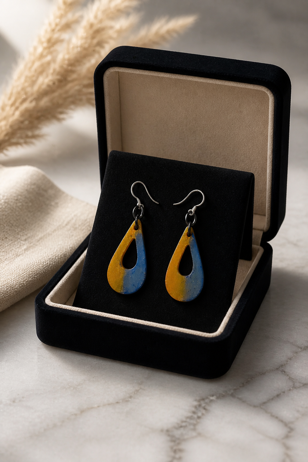 An elegant easy wearing hypo-allergenic earring. Turn heads with this one! One of a kind and not to be repeated.  L05