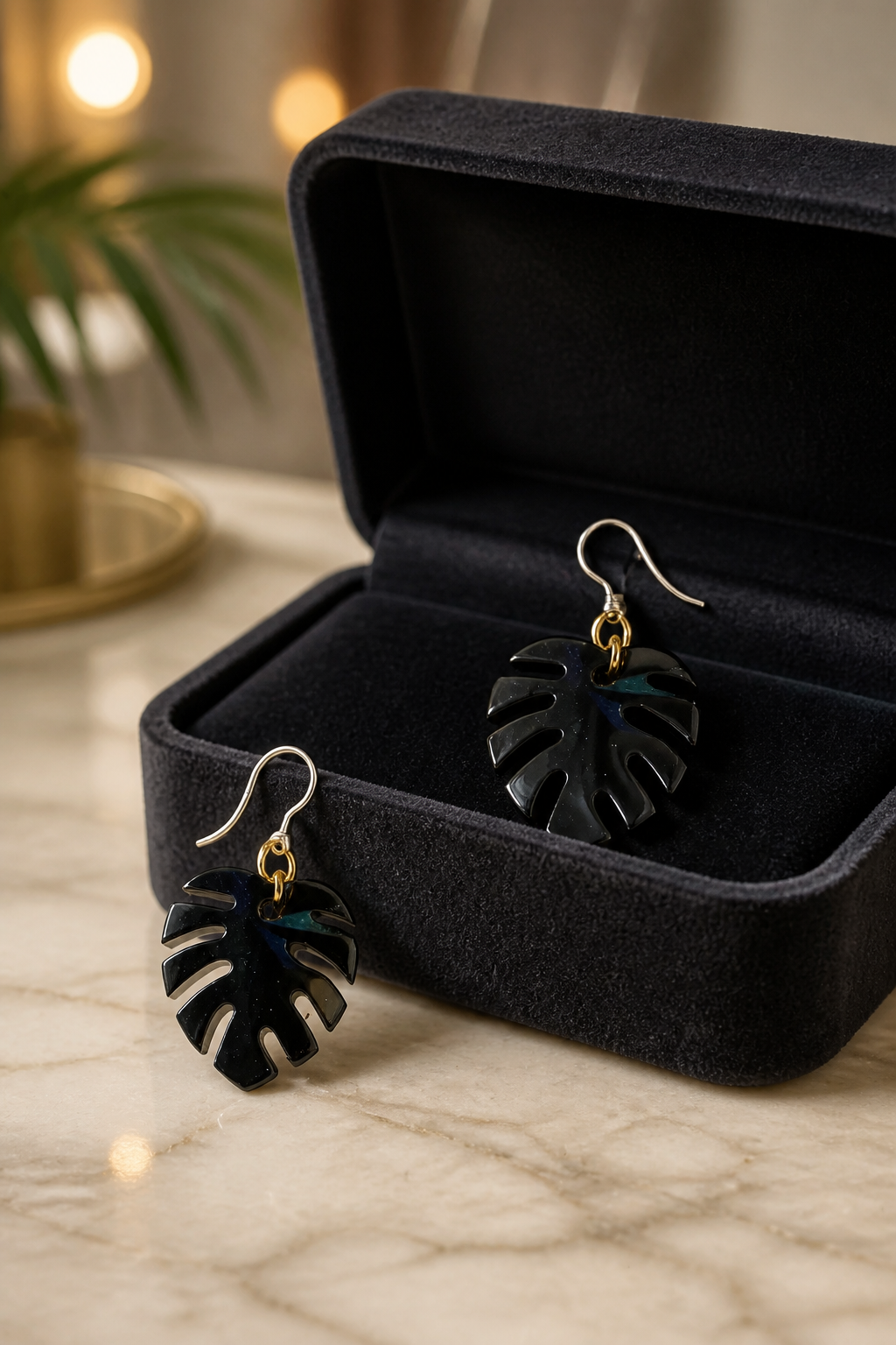 An elegant handmade resin earing with a modern artistic finish and hypo-allergenic hooks.  L09