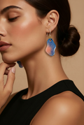 A stylish handmade earring with hypo-allergenic hooks for all day comfort.only one set made . Make it yours !   L10