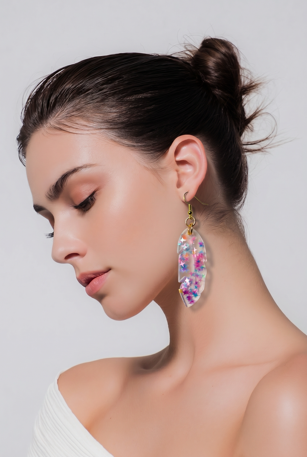 An elegant sophisticated statement piece with hypo-allergenic hooks, the ultimate party earring to turn heads . M01
