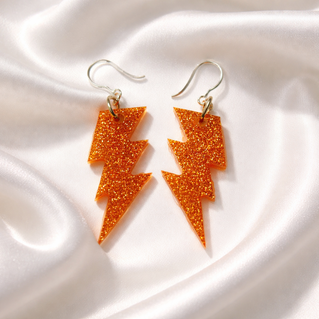 An elegant handmade earring that not everyone can have as only one is made. Fitted with hypo-allergenic hooks for a comfy and hygienic all day wear. grab me before I am gone.  M02