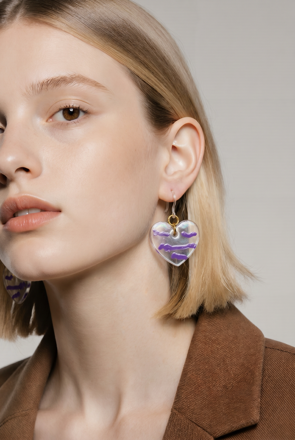 An elegant handmade earring with a modern artistic finish and hypo-allergenic hooks, made to turn heads.  M03