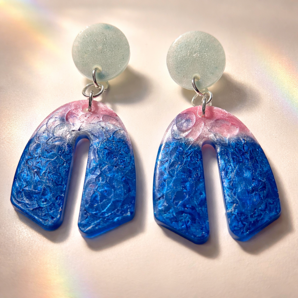A beautiful funky and stylish handmade earring. Made to enjoy and turn heads.  N06