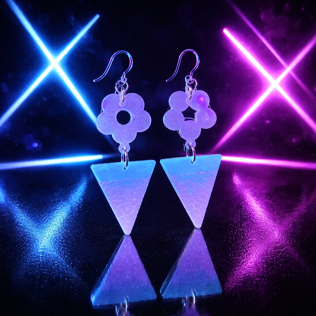 A cool funky party earring with UV glow and hypo-allergenic hooks. You can take this pair anywhere, make it part of your collection.  N09