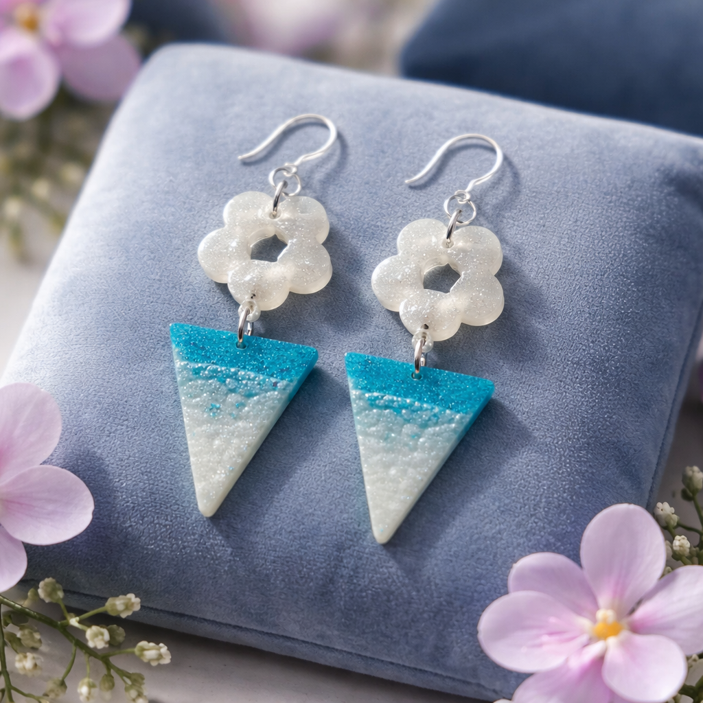 A cool funky party earring with UV glow and hypo-allergenic hooks. You can take this pair anywhere, make it part of your collection.  N09