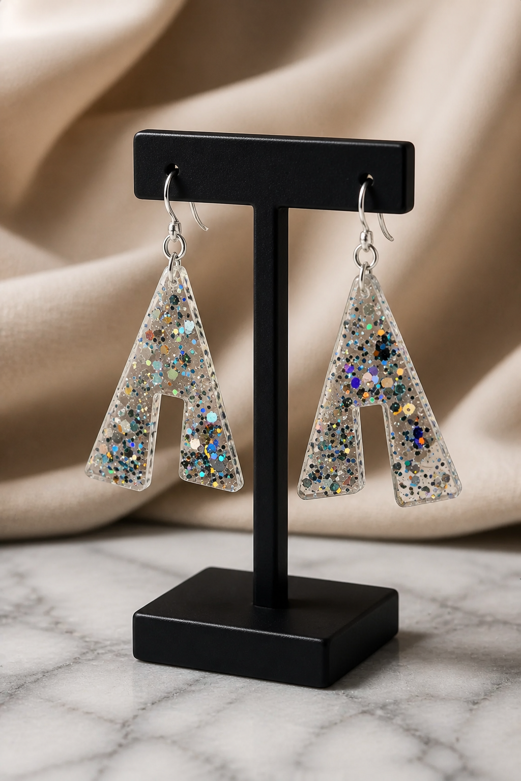 A glitter bug,  funky party earring with hypo-allergenic hooks for comfort and hygiene. Only one made, when it is gone it is gone.  N10