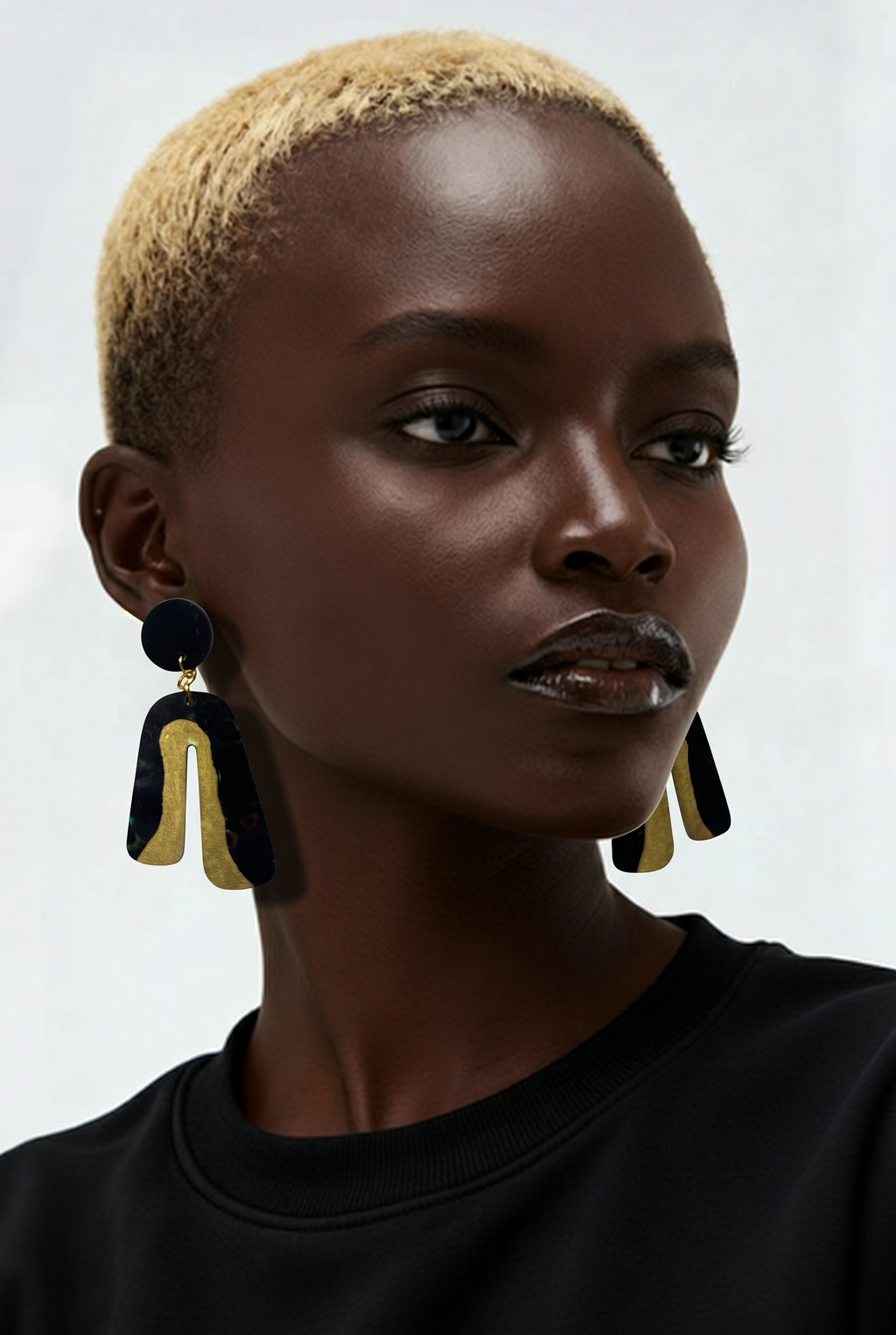 A stylish handmade resin earrings with a modern artistic finish. Made for everyday elegance.   P05