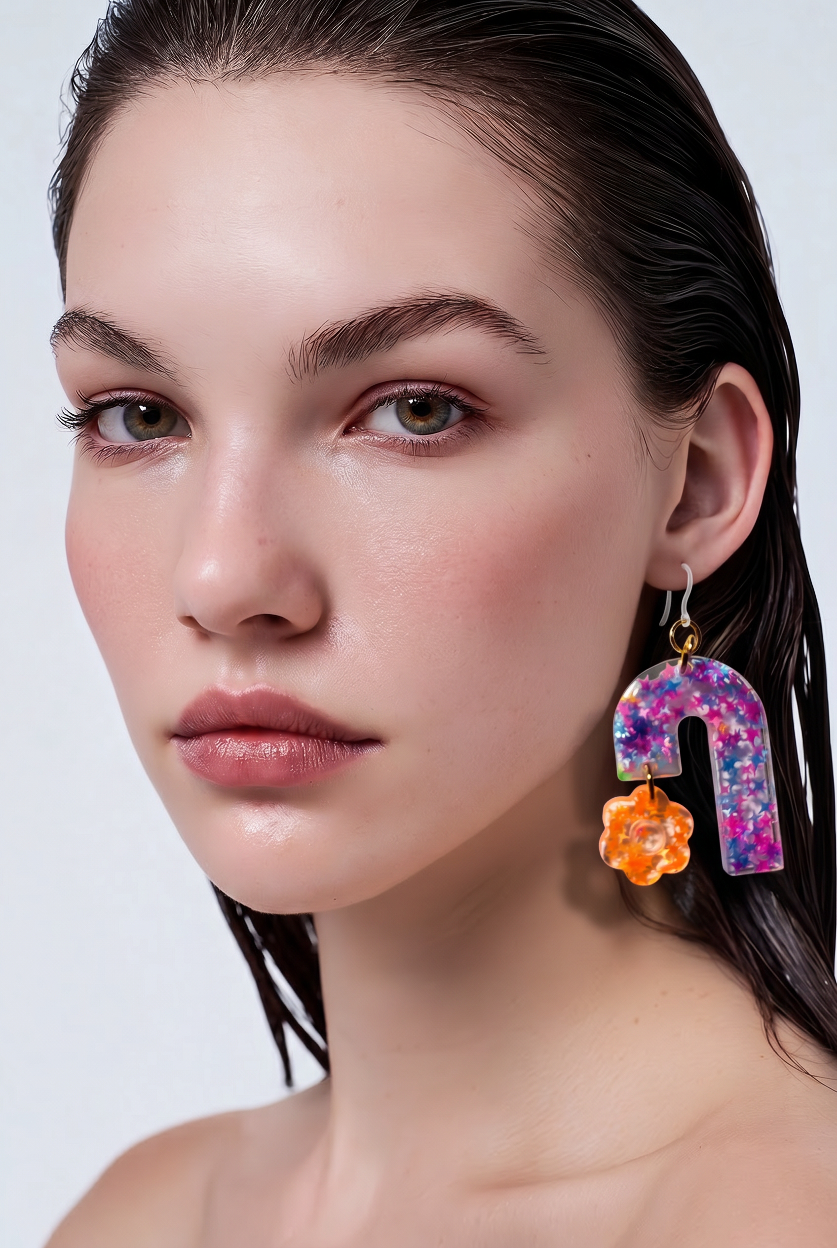 A bold funky UV glow party earring to transform your everyday style to elegance . R07