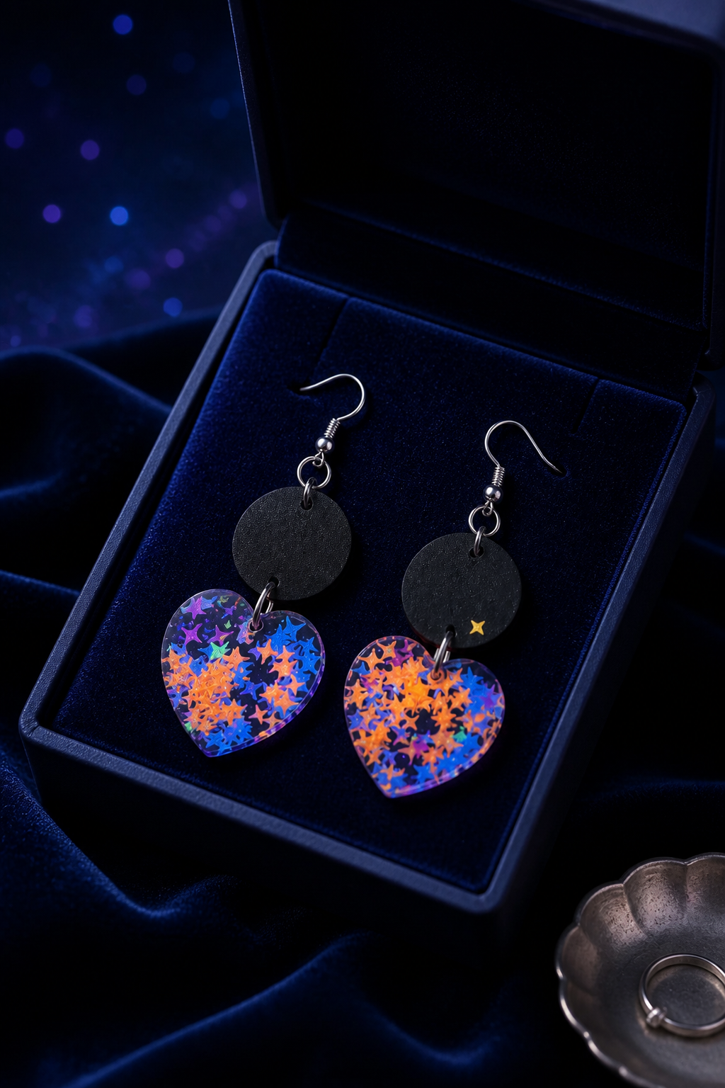 A glam funky party earring with comfy hooks and uv glow. Elegance to take home .    R012
