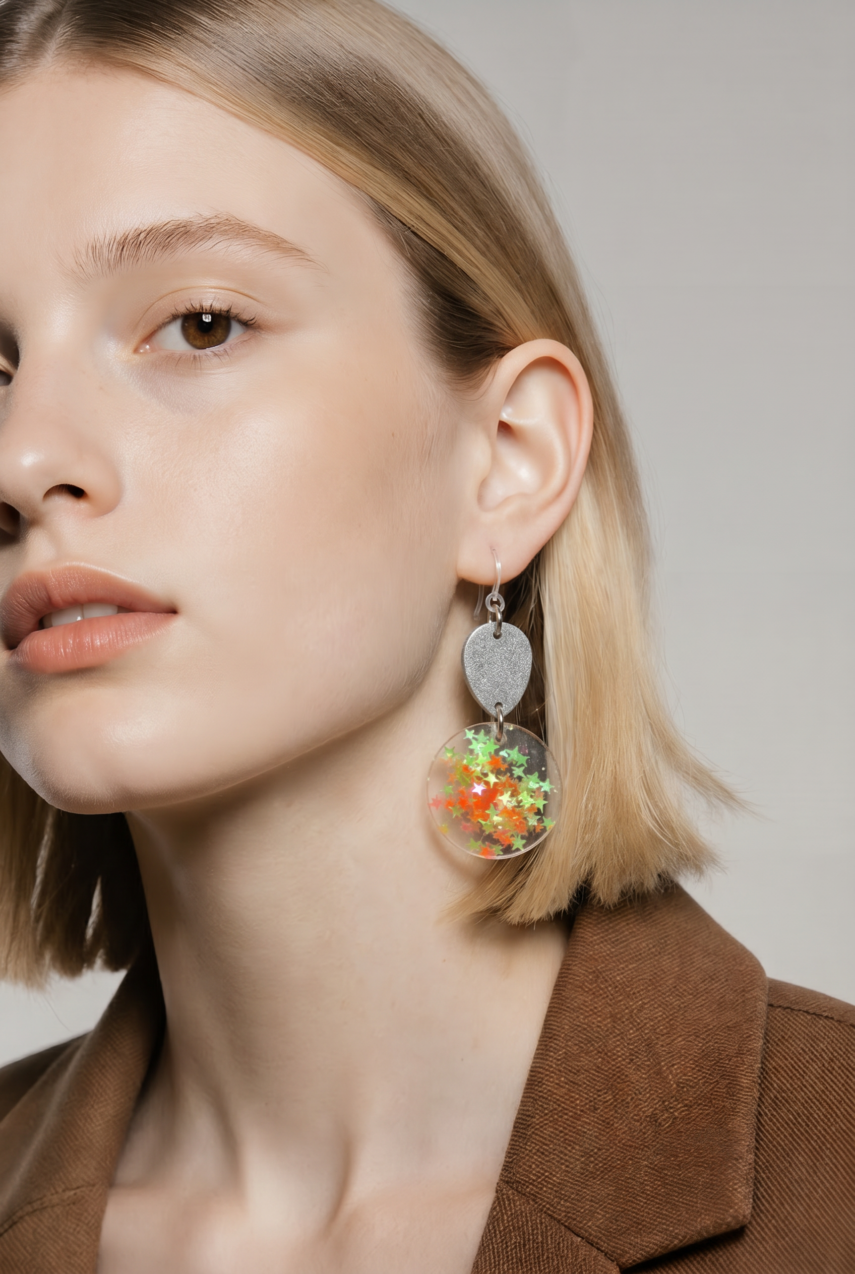 A cool glam funky party earring with uv glow and comfy hooks. Elegance to turn heads   R013