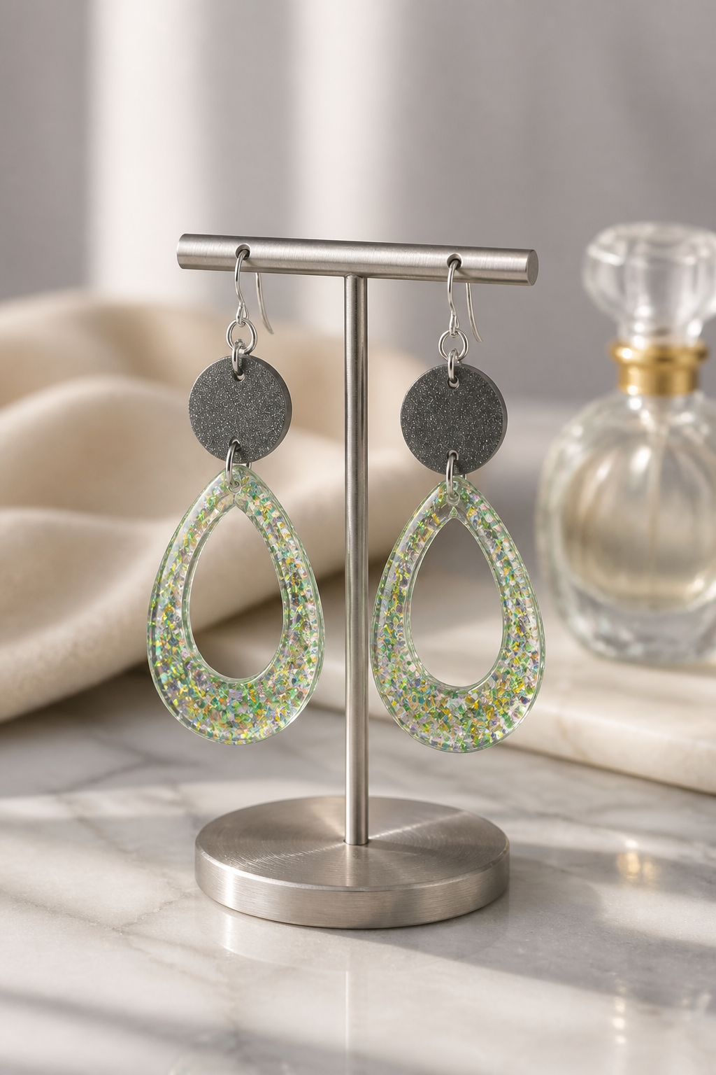 A cool funky party earring that glows in the dark has uv glow and comfy hooks. Beautiful lightweight designed to complement any outfit.    R 015