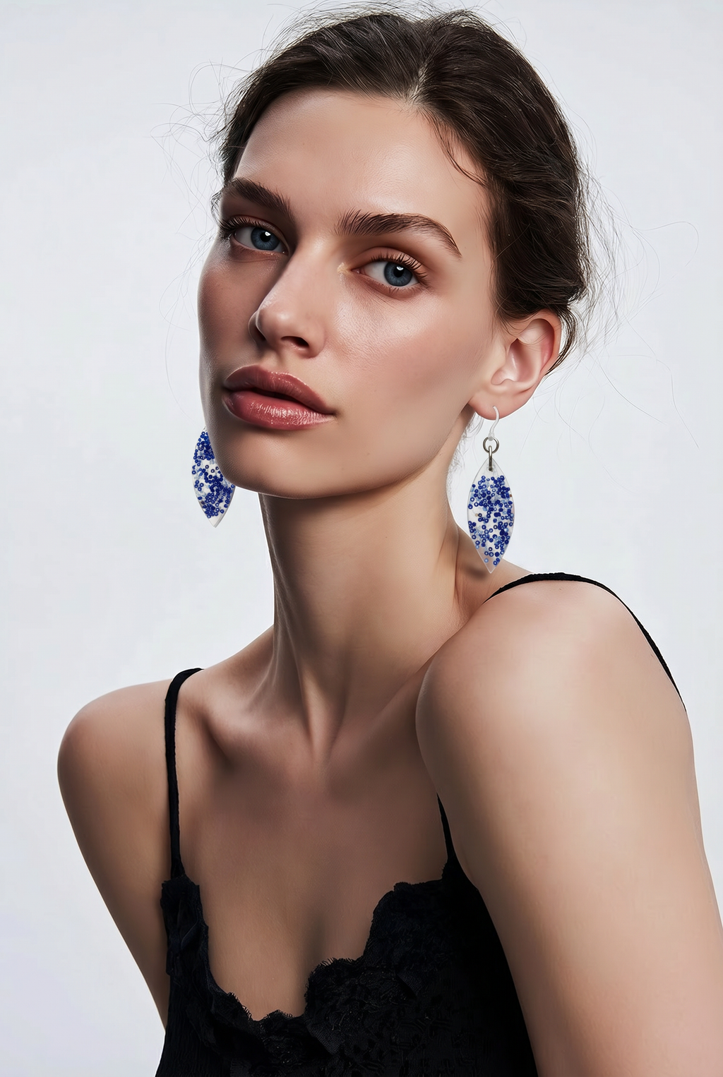 A stylish and glam handmade earring. Lightweight, bold, and designed to impress - perfect for any look.   S01