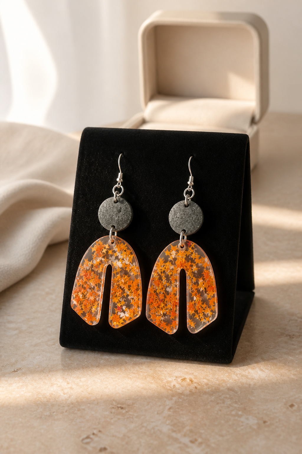 Elegant, stylish party earrings, Sparkle and shine at any party. fitted with UV glow and hypo-allergenic hooks. crafted to turn heads .   S04