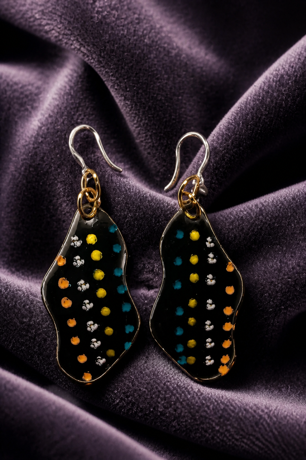 Cool glam funky handmade earrings . Made to enjoy wearing. Glam any outfit and your collection. Make these yours ! V01