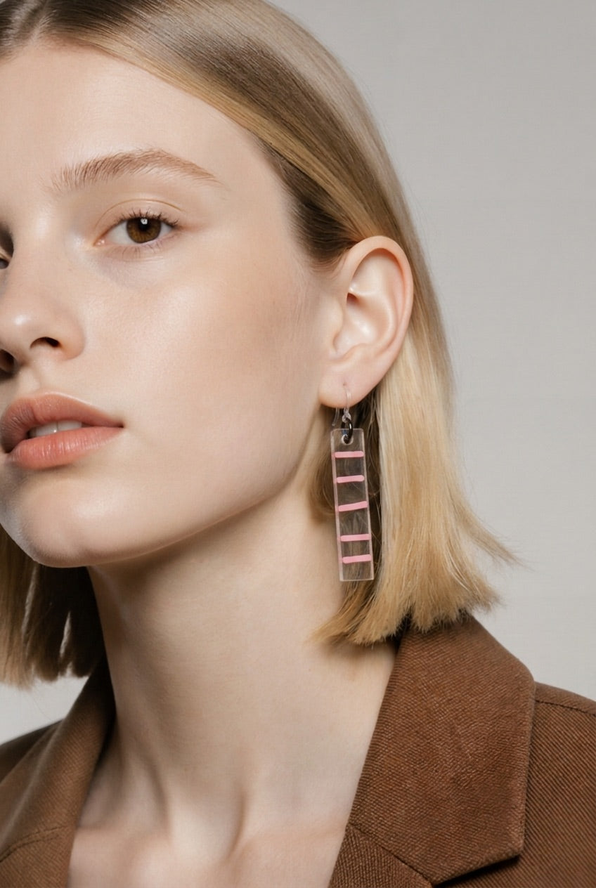 A stylish elegant hypo-allergenic handmade earring. You didn't ask for them, but you need them.  V09