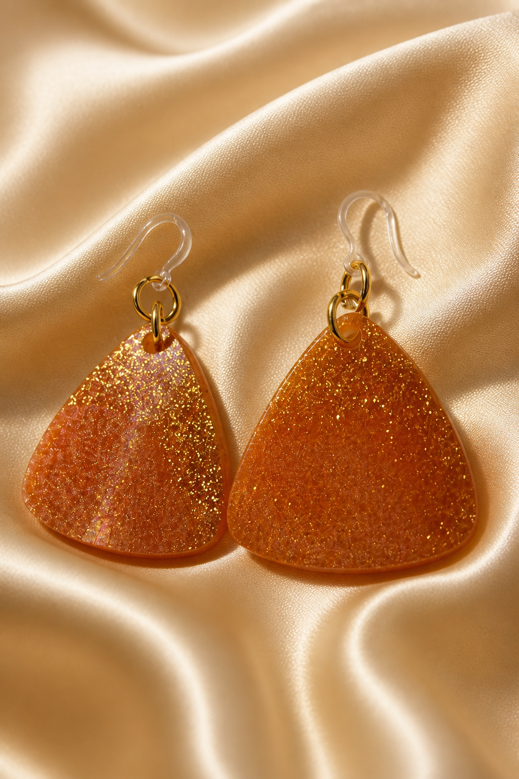 A beautiful beauty . Your earlobes are ready for their close-up with these unique hypo-allergenic handmade earrings. One of a kind. Perfect for your collection.     H08