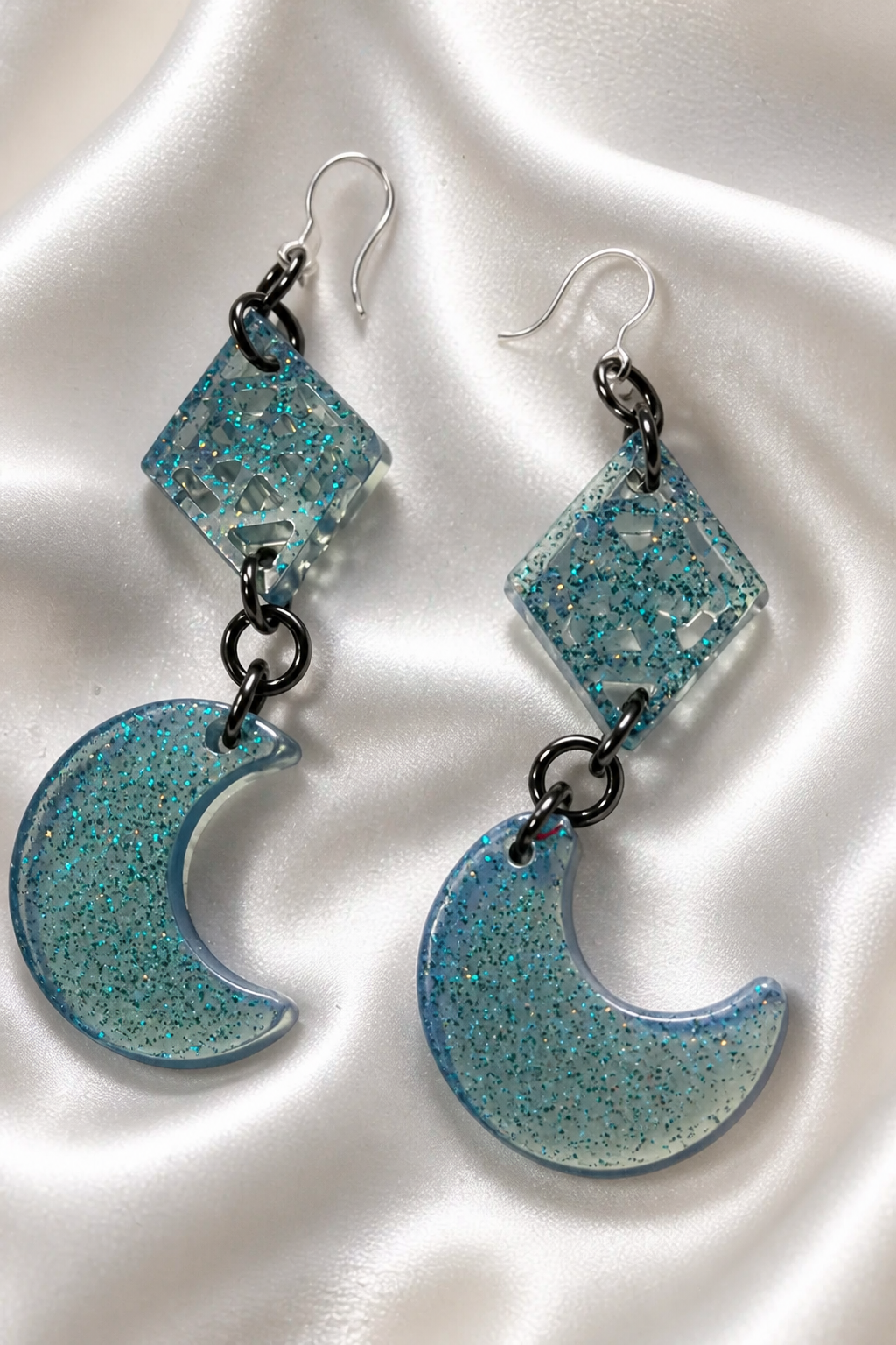 Beautiful funky elegance. Handmade hypo-allergenic earrings. Comfy hooks for all day wear. Rock your party with these head turners .     E01