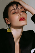Beautiful , elegant and stylish. Handmade earrings with comfy hooks. Made to stand out and turn heads. Make it part of your collection .      D07