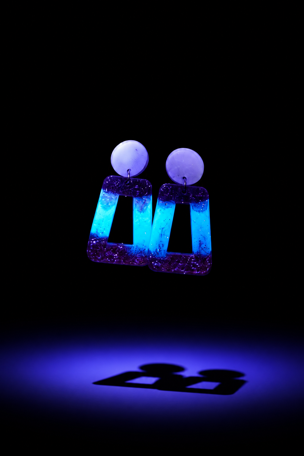 Beautiful UV glow handmade earrings. The ultimate party earring. Turn heads , add this set to your collection.!  C04