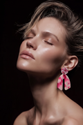 Beautiful cool party handmade earrings. UV glow to add sparkle to your party . Be the center of attraction .       C01