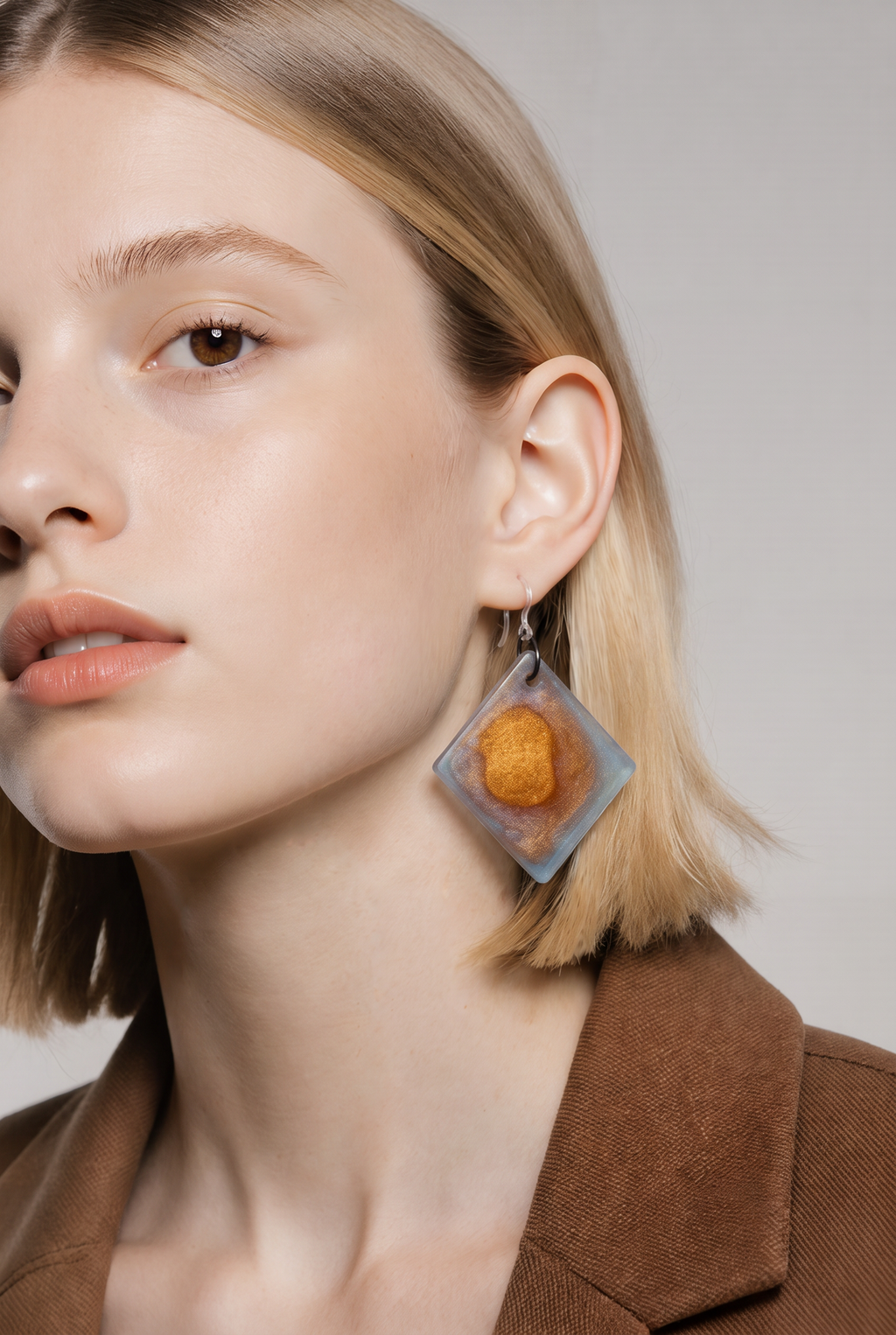 Classic funky elegance , a unique handmade earring. Lightweight with hypo-allergenic comfy hooks. One of a kind. Exquisite elegance waiting for you!  B09