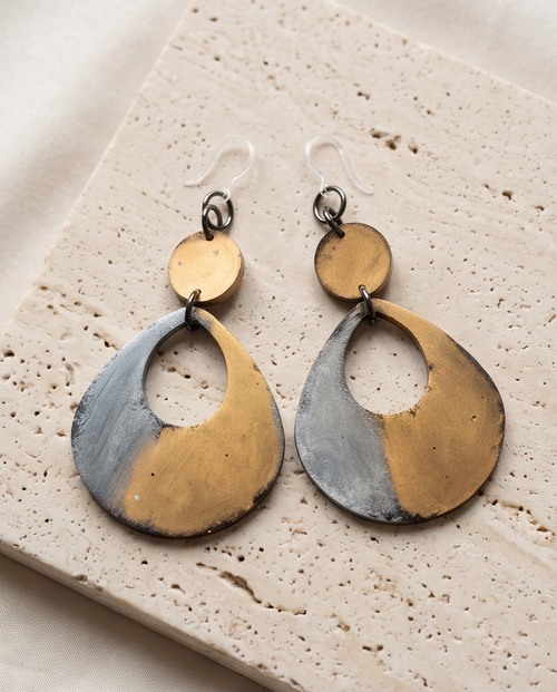 A Beautiful elegant rustic handmade earring with comfy hypo-allergenic hooks.Design W02   www.chakor.co.za