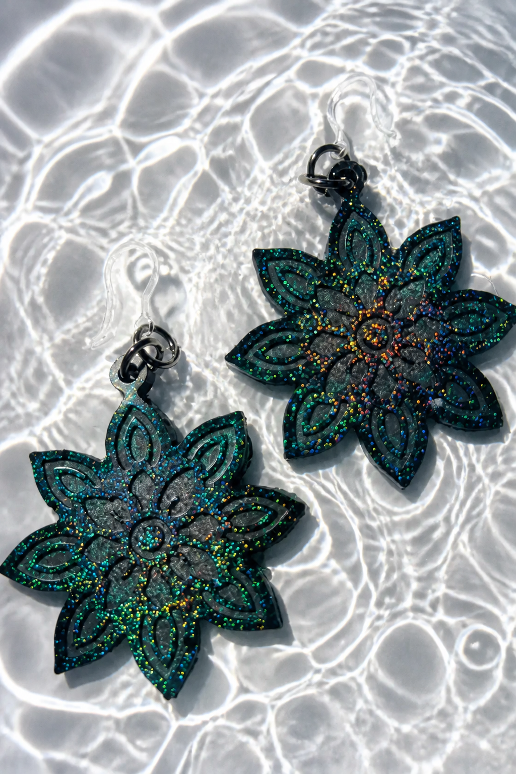 Elevate your evening look with these shimmering floral handcrafted earrings. Design X03 www.chakor .co.za